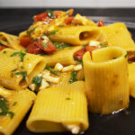 Paccheri con filetto di spigola e pomodorini